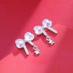 Bow Earrings in 925 Sterling Silver, Pastel Crystal with Star Drop