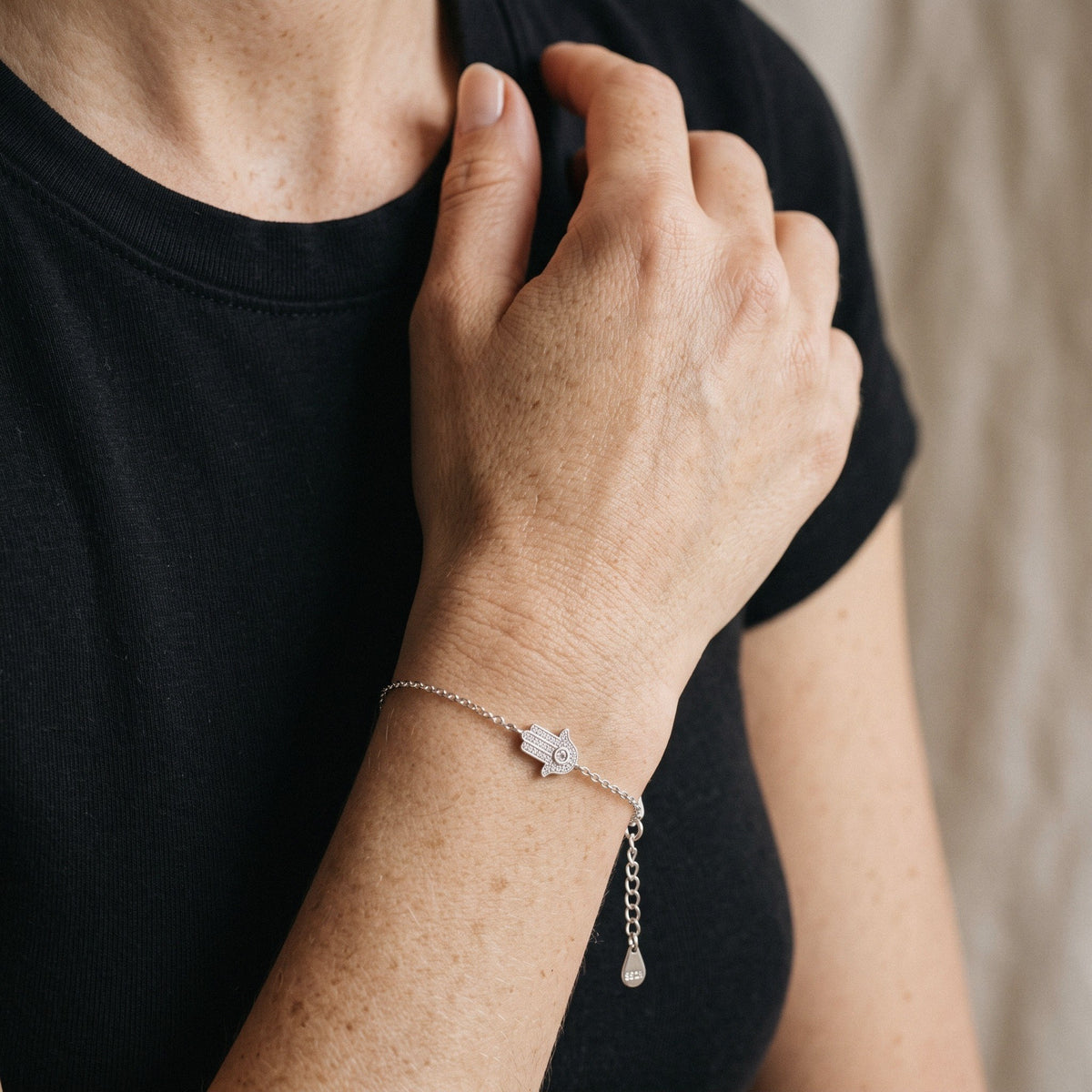 Hamsa Bracelet in 925 Sterling Silver, Pavé Cubic Zirconia Charm - worn
